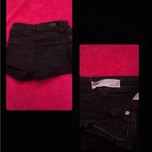 Black jean shorts. They run a little small because they've been washed a few